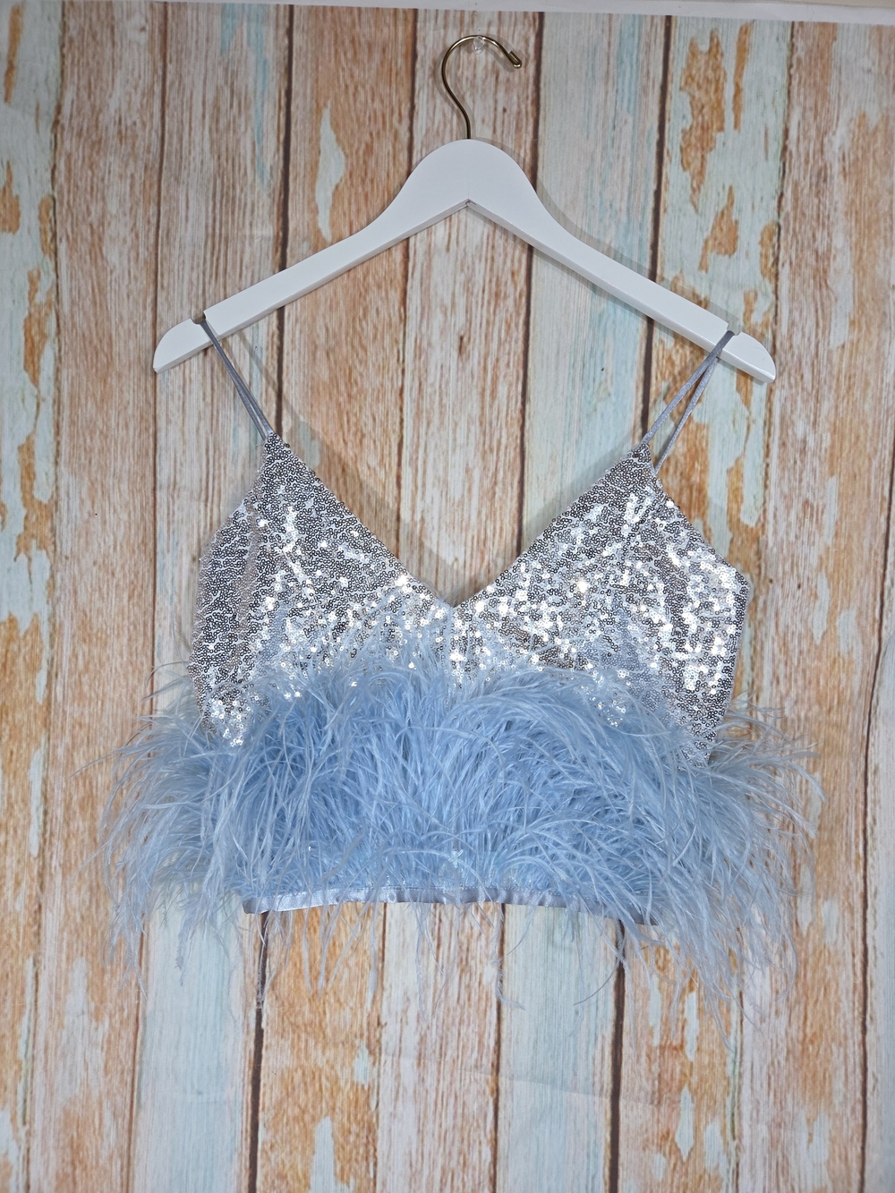 Phannita silver sequin crop top with light blue ostrich feather trim. Size Small